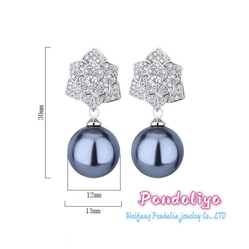 Dazzling: Pearl earrings from the Camellia series, available in two colors, showcasing your unique charm and radiating a dazzling style!