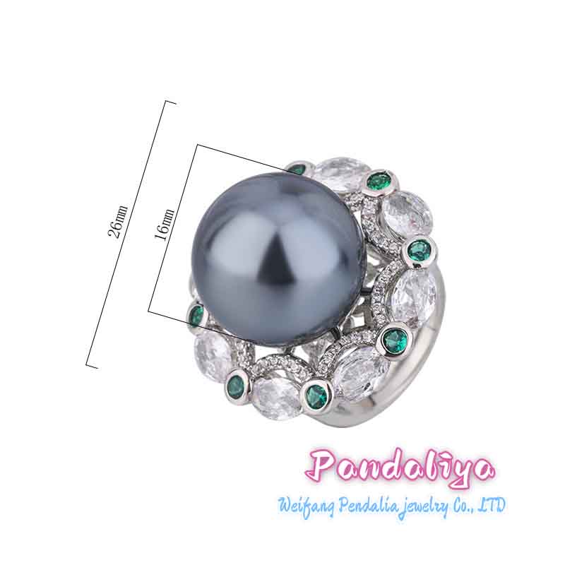 A magnificent ring adorned with large pearls and colorful gemstones, complementing each other perfectly, vibrant and charming, enhancing your unique charm.