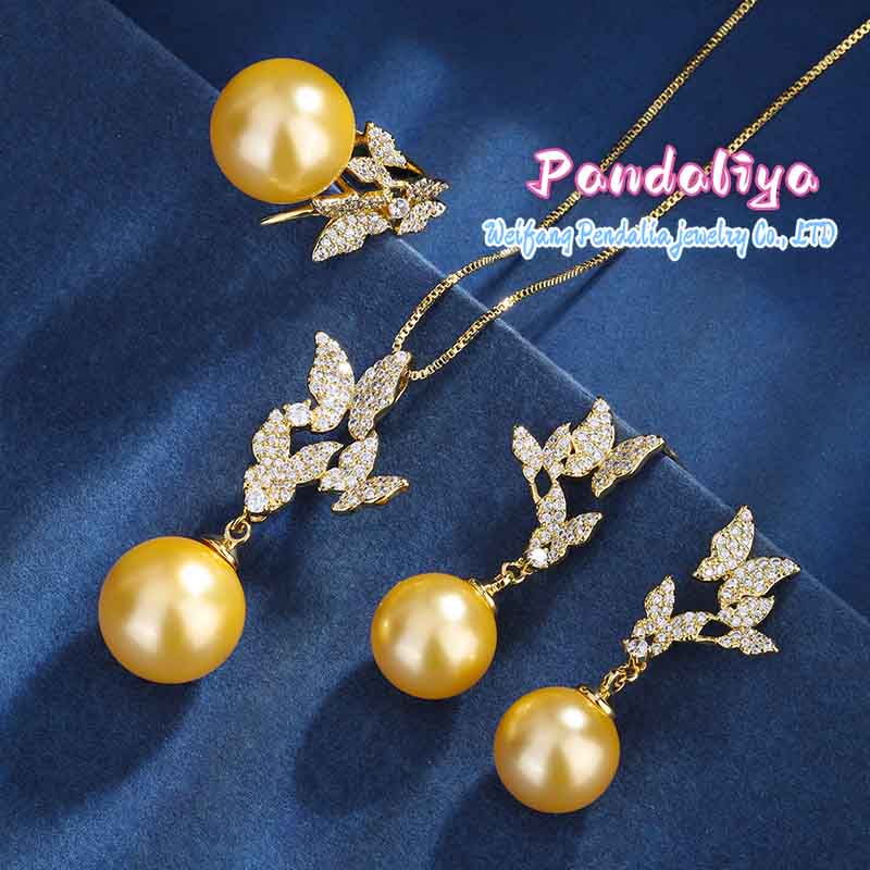 Golden Pearl Ensemble, meticulously handcrafted with diamond inlays, inspired by butterflies, showcasing unique charm and elegant demeanor.