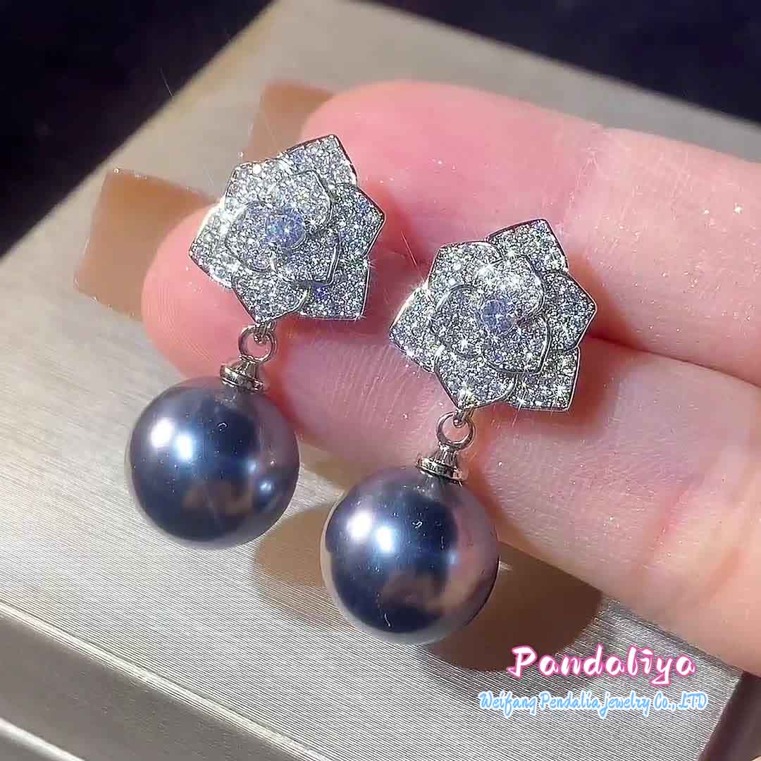 Dazzling: Pearl earrings from the Camellia series, available in two colors, showcasing your unique charm and radiating a dazzling style!