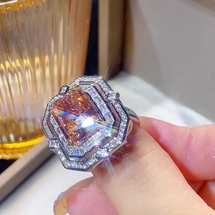 Color Gemstone Ring adorned with square diamonds, emitting charming radiance, seamlessly blending luxurious elegance with glamorous design, showcasing impeccable fashion taste!