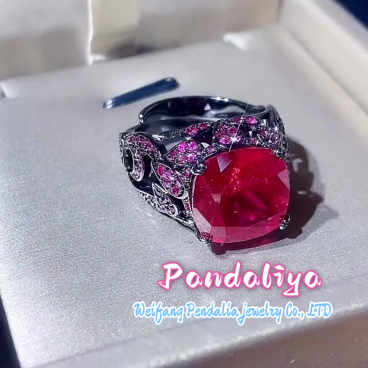 Colored Gemstone Ring: Light luxury design, fashionable trend, personalized gemstone embellishment, black gold material highlights taste and quality.