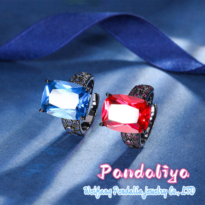 Colorful Gemstone Ring: Crafted in black gold, perfectly complemented by red spinel and blue kyanite, showcasing a trendy and avant-garde style, exuding unique charm.