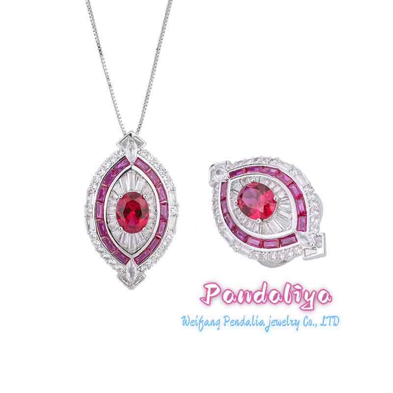 Red ruby set, exquisitely designed, shimmering with full-set diamonds, radiating a magnificent and dazzling brilliance, showcasing luxurious taste.