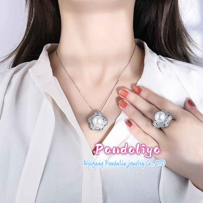 A unique pearl set, with its distinctive design showcasing boundless creativity, exudes captivating charm and personality, embodying your distinct fashion taste that sets you apart from the crowd.