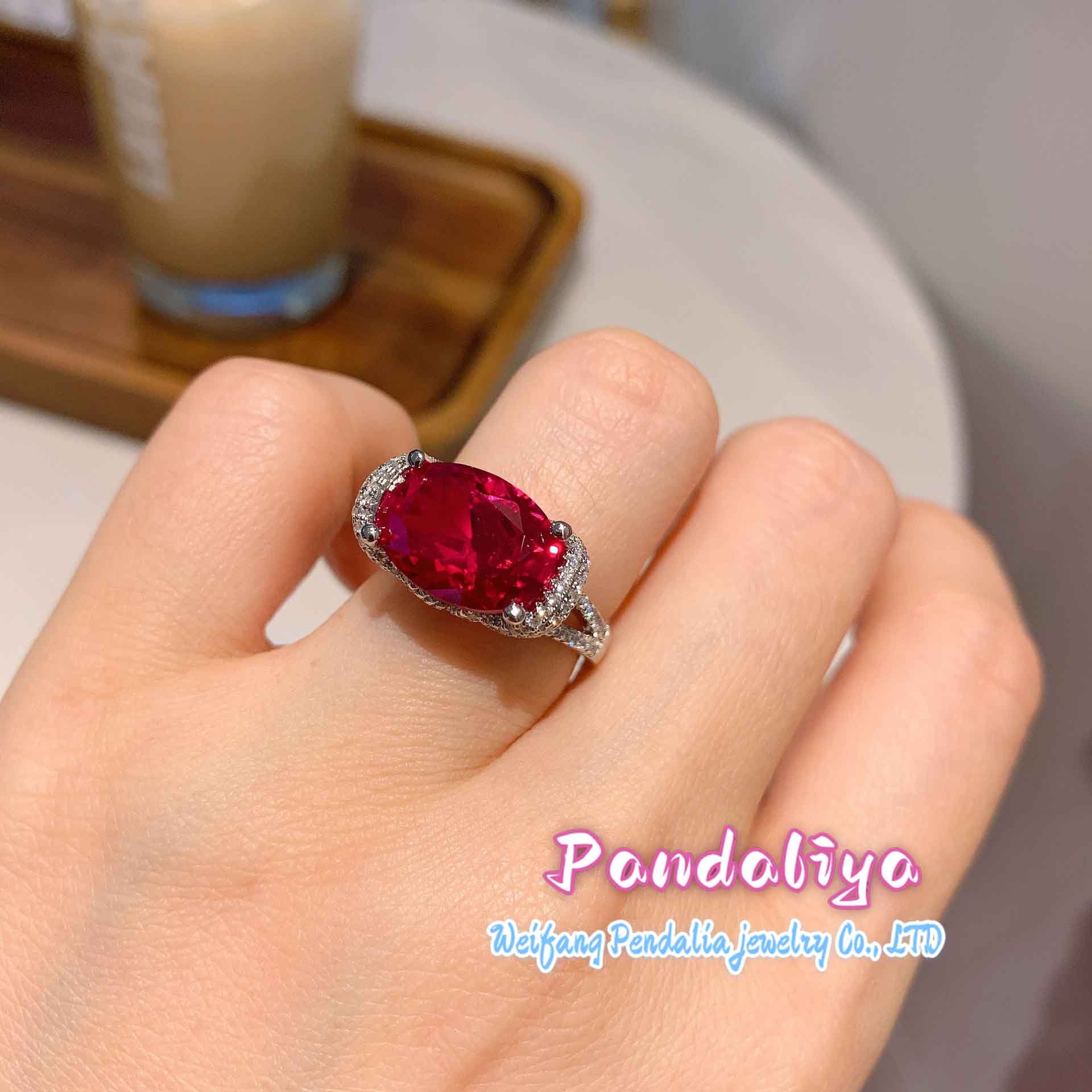 Four different-colored gemstone rings, sparkling with diamond accents, shine brilliantly, showcasing the luxuriousness of diamonds and the colorful charm, attracting all eyes.