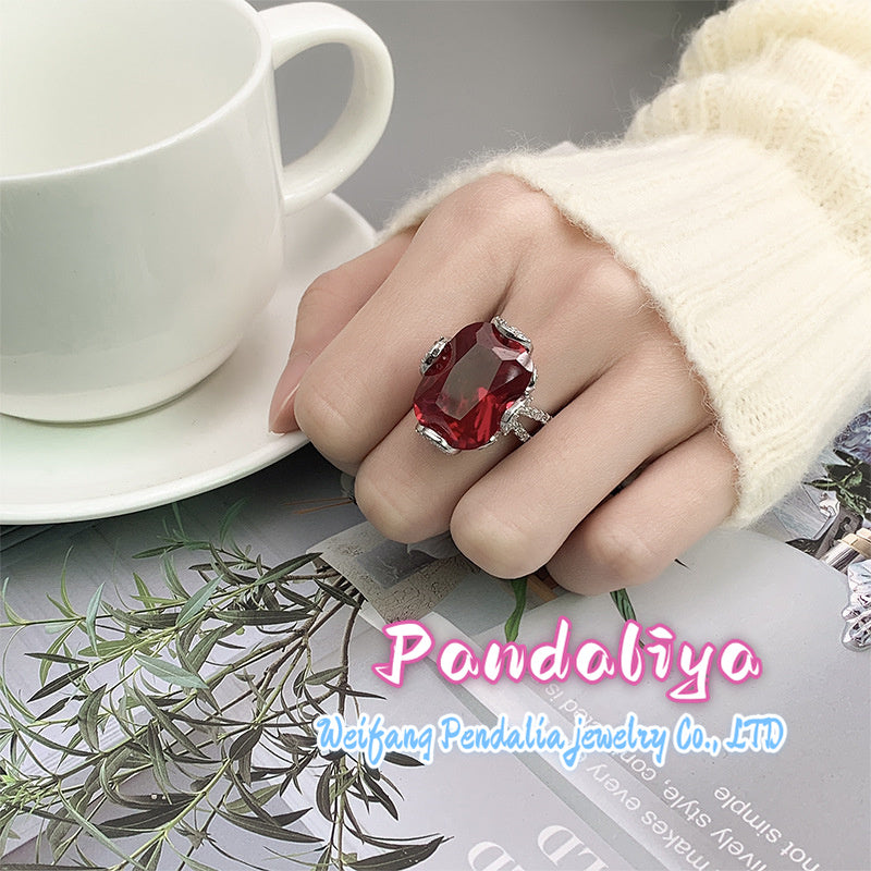 Colored Gemstone Ring: Classic style, light luxury design, showcasing elegant splendor, achieving dazzling beauty of fashion.