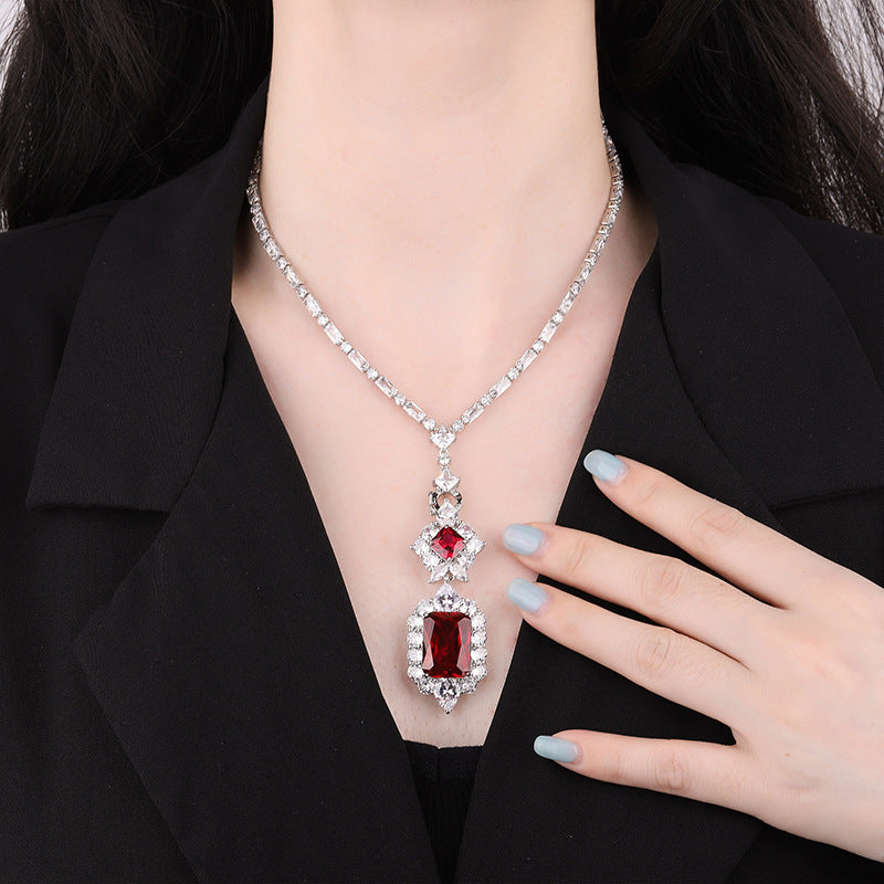 A simulated gemstone necklace with a square design, exuding an aura of affordable luxury. It dazzles and captivates, making you the center of attention.