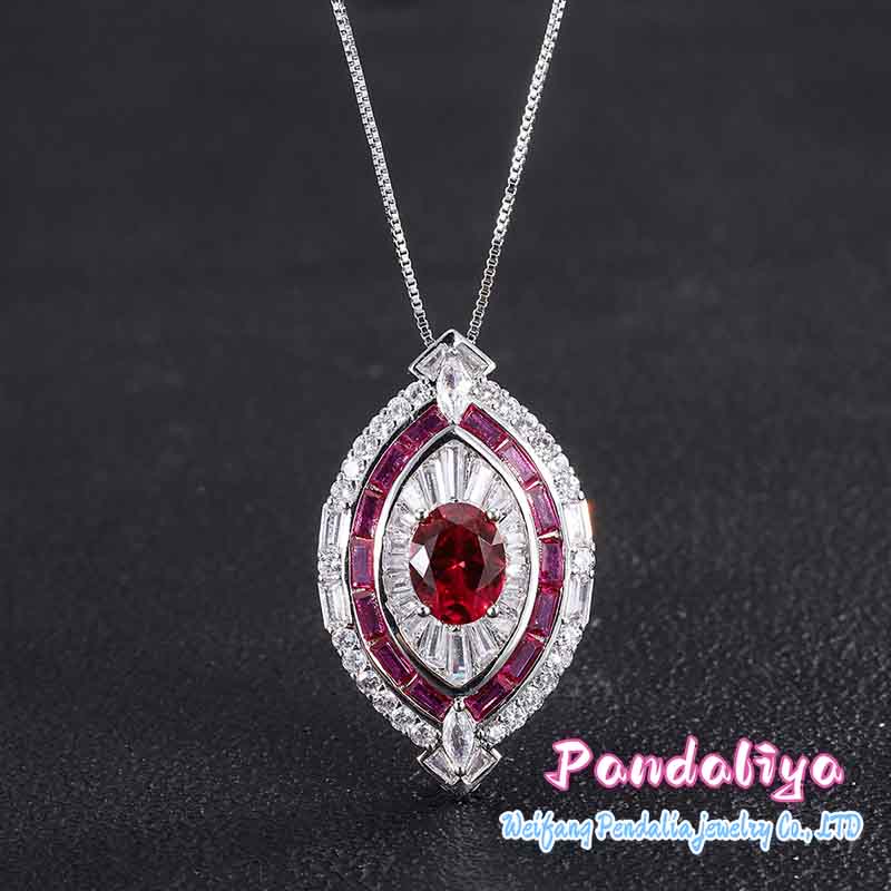 Red ruby set, exquisitely designed, shimmering with full-set diamonds, radiating a magnificent and dazzling brilliance, showcasing luxurious taste.