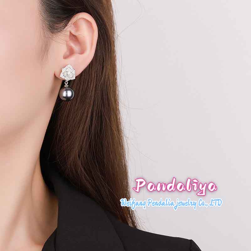 Dazzling: Pearl earrings from the Camellia series, available in two colors, showcasing your unique charm and radiating a dazzling style!