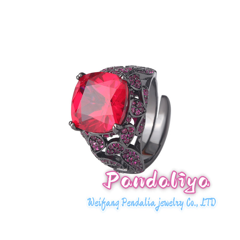 Colored Gemstone Ring: Light luxury design, fashionable trend, personalized gemstone embellishment, black gold material highlights taste and quality.