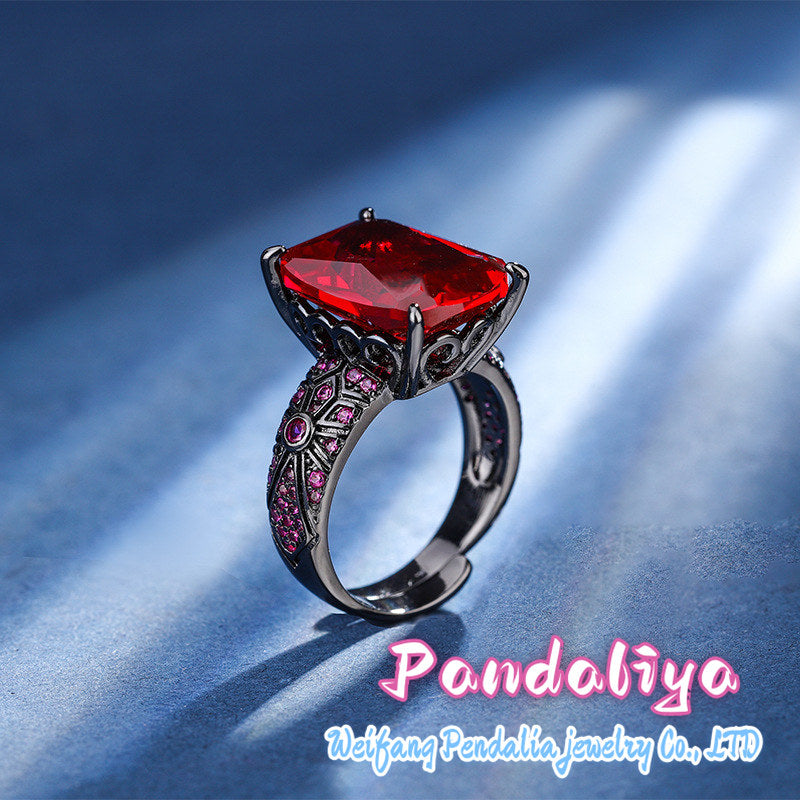 Colorful Gemstone Ring: Crafted in black gold, perfectly complemented by red spinel and blue kyanite, showcasing a trendy and avant-garde style, exuding unique charm.