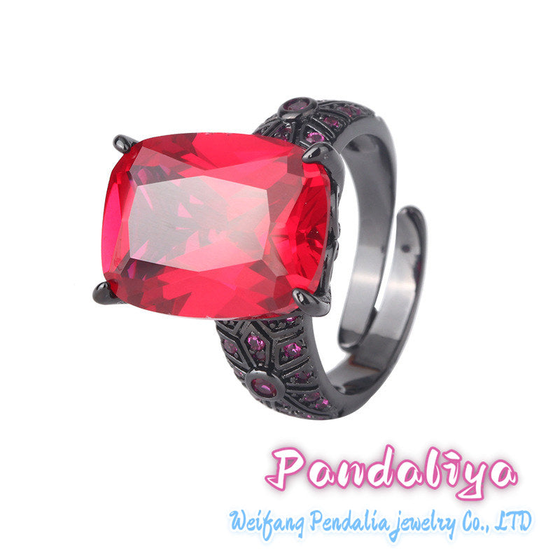 Colorful Gemstone Ring: Crafted in black gold, perfectly complemented by red spinel and blue kyanite, showcasing a trendy and avant-garde style, exuding unique charm.