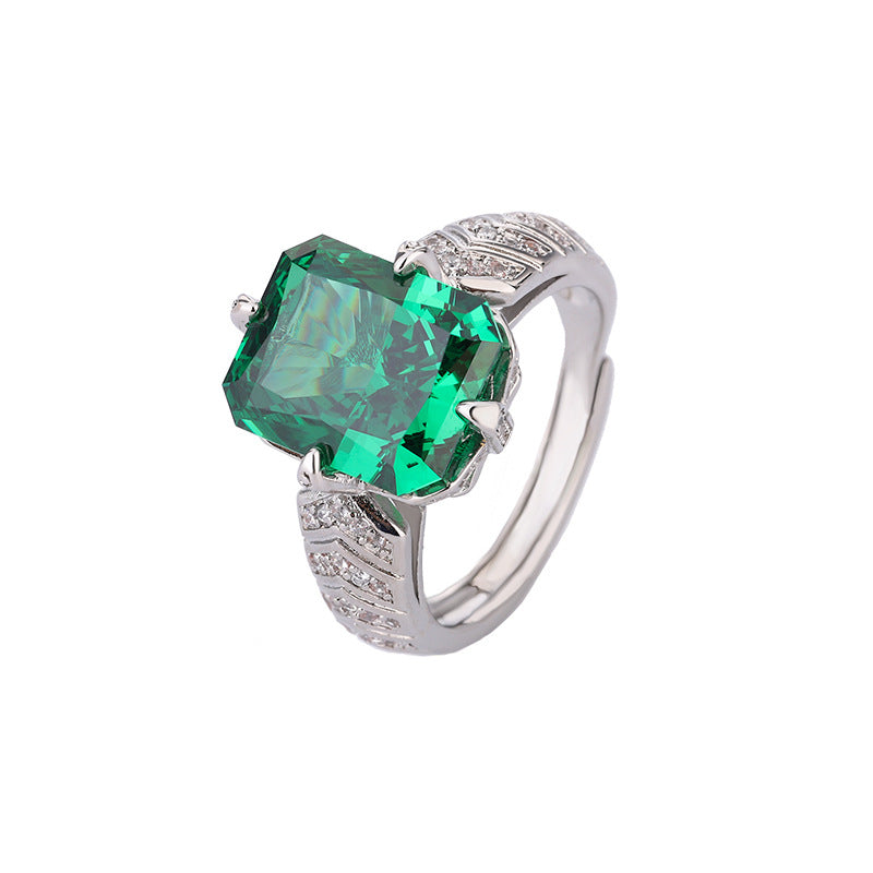 Gemstone ring, with its luxurious design and intricate frosty cuts, emanates captivating charm, drawing all eyes towards it!