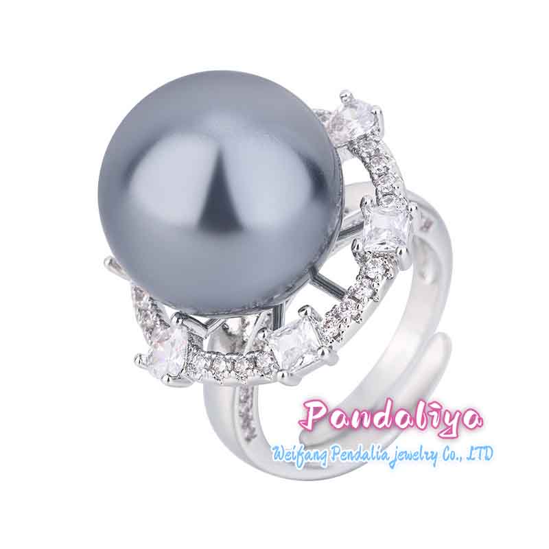 A meticulously crafted ring featuring a selected 16mm pearl design, showcasing unique craftsmanship and exquisite artistry, radiating with dazzling brilliance, truly worthy of collection.