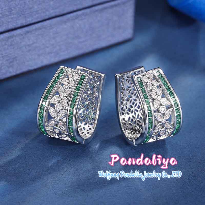 Earrings made of various colored gemstones, with a beautiful hollow design, exude elegance, and crafted from hypoallergenic materials for safe wearing.