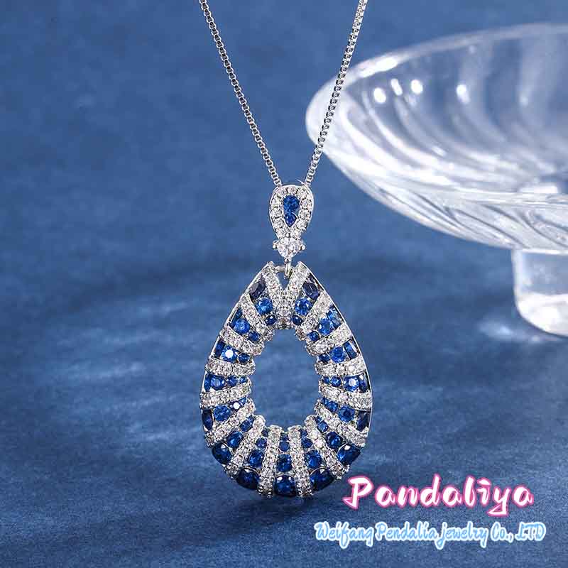 A design-inspired sapphire set, fully embellished with diamonds, shines brilliantly, showcasing unique taste and emitting enchanting radiance, enhancing your noble charm!