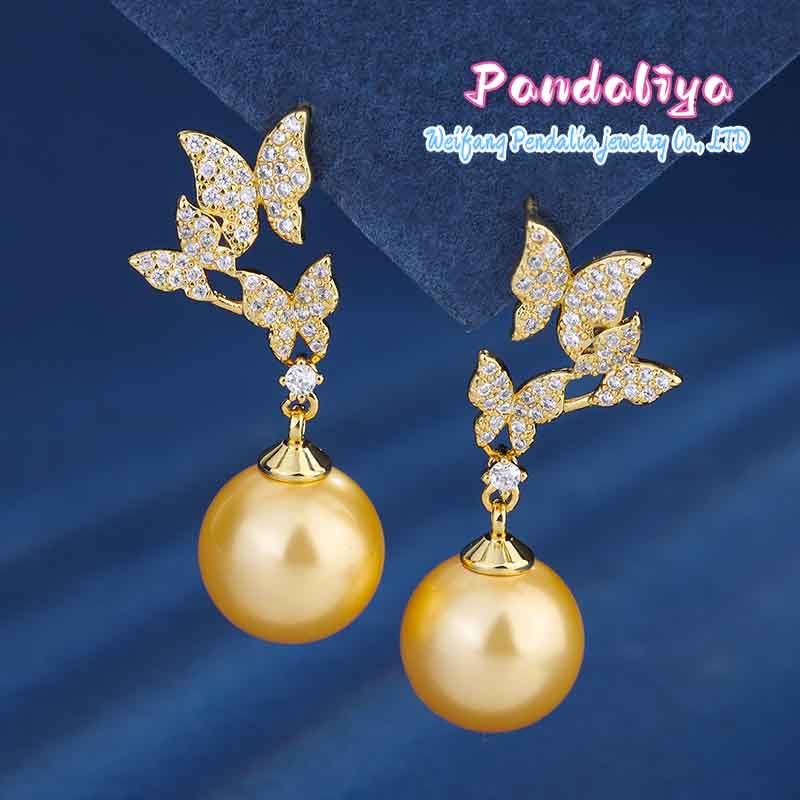 Golden Pearl Ensemble, meticulously handcrafted with diamond inlays, inspired by butterflies, showcasing unique charm and elegant demeanor.