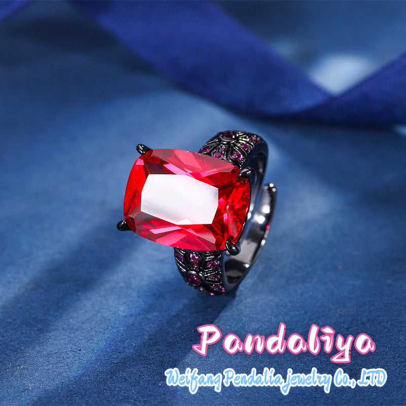 Colorful Gemstone Ring: Crafted in black gold, perfectly complemented by red spinel and blue kyanite, showcasing a trendy and avant-garde style, exuding unique charm.