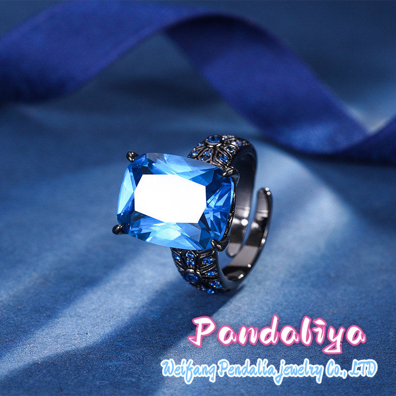 Colorful Gemstone Ring: Crafted in black gold, perfectly complemented by red spinel and blue kyanite, showcasing a trendy and avant-garde style, exuding unique charm.