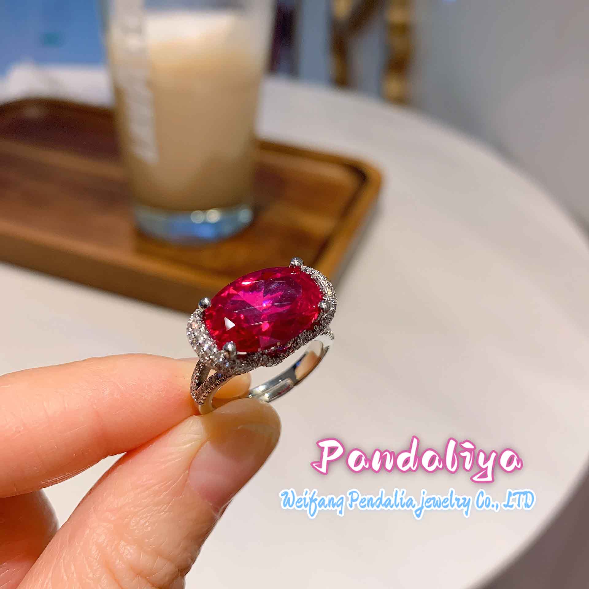 Four different-colored gemstone rings, sparkling with diamond accents, shine brilliantly, showcasing the luxuriousness of diamonds and the colorful charm, attracting all eyes.