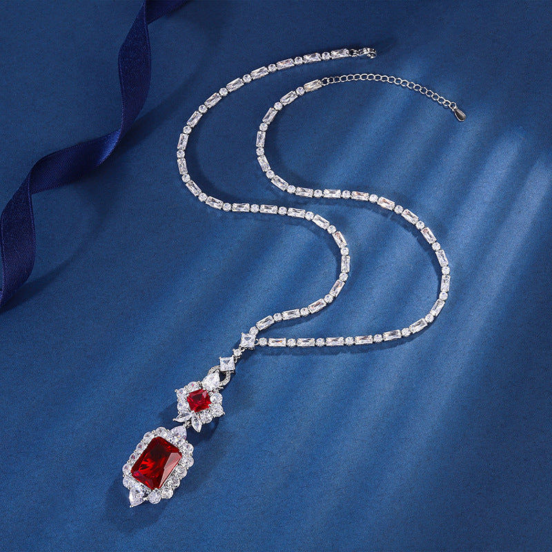 A simulated gemstone necklace with a square design, exuding an aura of affordable luxury. It dazzles and captivates, making you the center of attention.