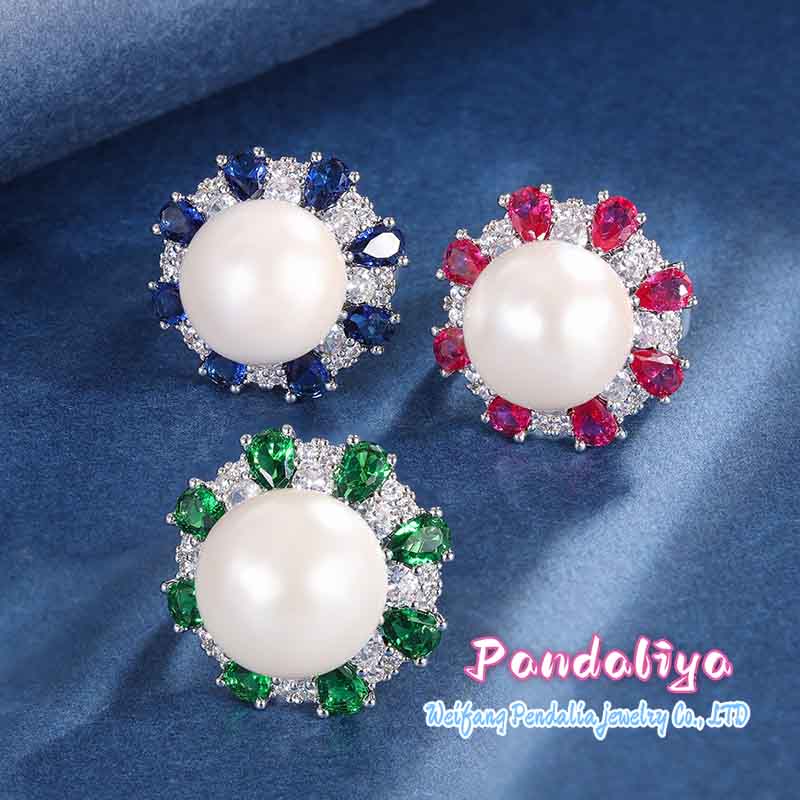 The white pearl ring, adorned with sparkling colorful gemstones, resembles blooming flowers, vibrant and colorful, showcasing the splendorous life of women!