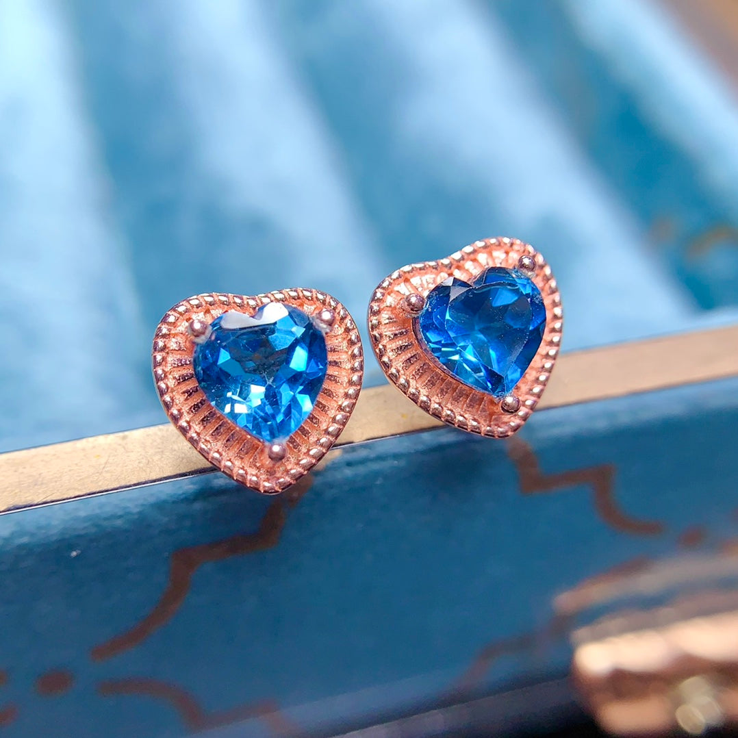 Heart-shaped earrings made of natural gemstones with unique craftsmanship, available in two gemstone options: topaz and garnet.