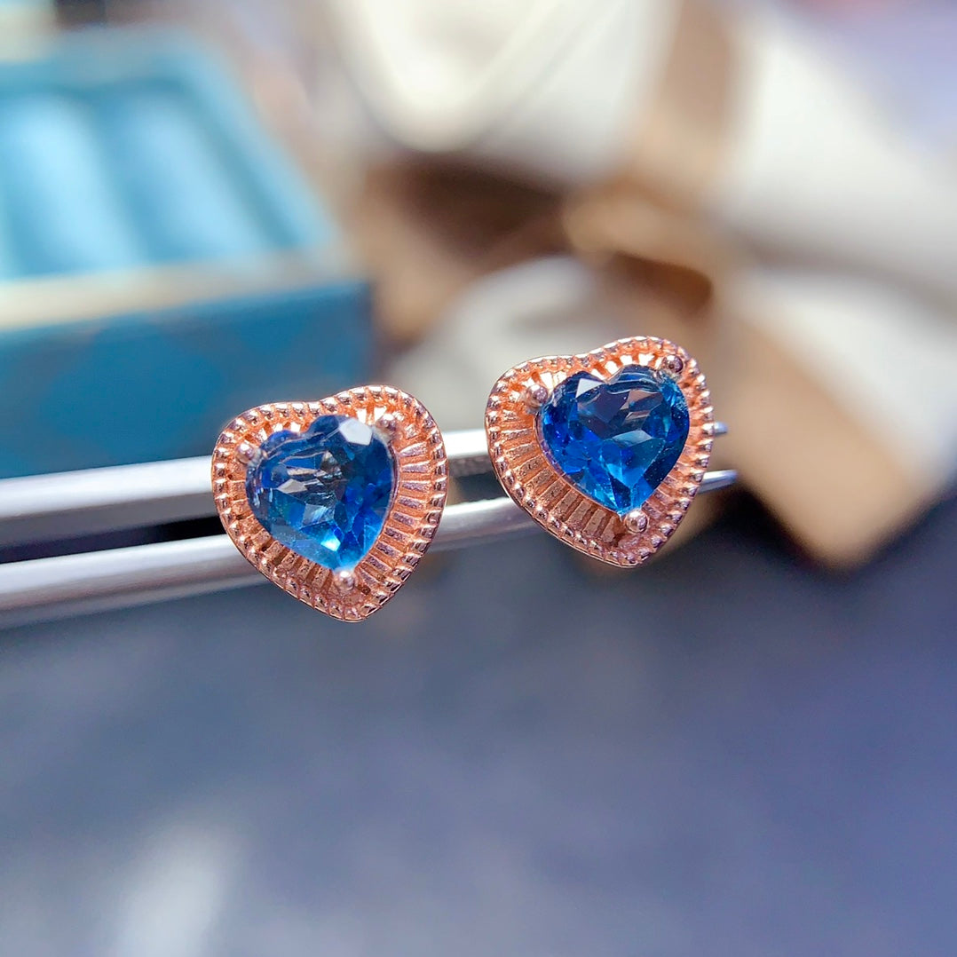 Heart-shaped earrings made of natural gemstones with unique craftsmanship, available in two gemstone options: topaz and garnet.