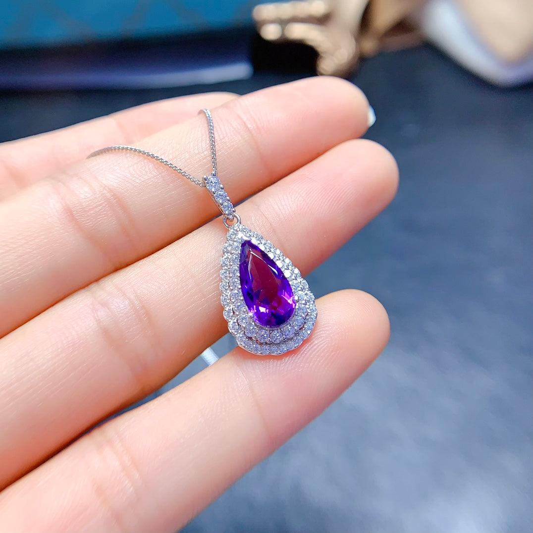 Natural crystal anf Sapphire necklace, teardrop-shaped, handcrafted with each stone being a large natural zircon. A luxurious piece to adorn your neck.