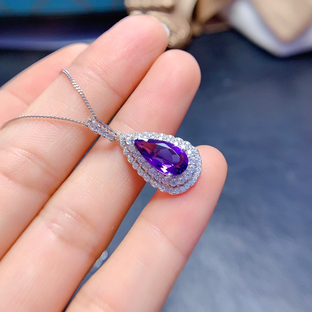 Natural crystal anf Sapphire necklace, teardrop-shaped, handcrafted with each stone being a large natural zircon. A luxurious piece to adorn your neck.