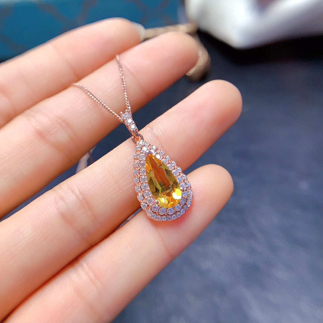 Natural crystal anf Sapphire necklace, teardrop-shaped, handcrafted with each stone being a large natural zircon. A luxurious piece to adorn your neck.