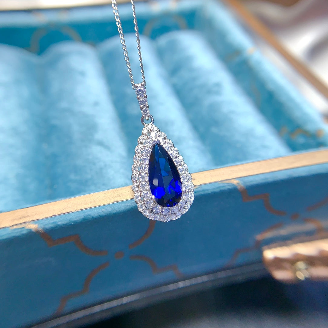 Natural crystal anf Sapphire necklace, teardrop-shaped, handcrafted with each stone being a large natural zircon. A luxurious piece to adorn your neck.