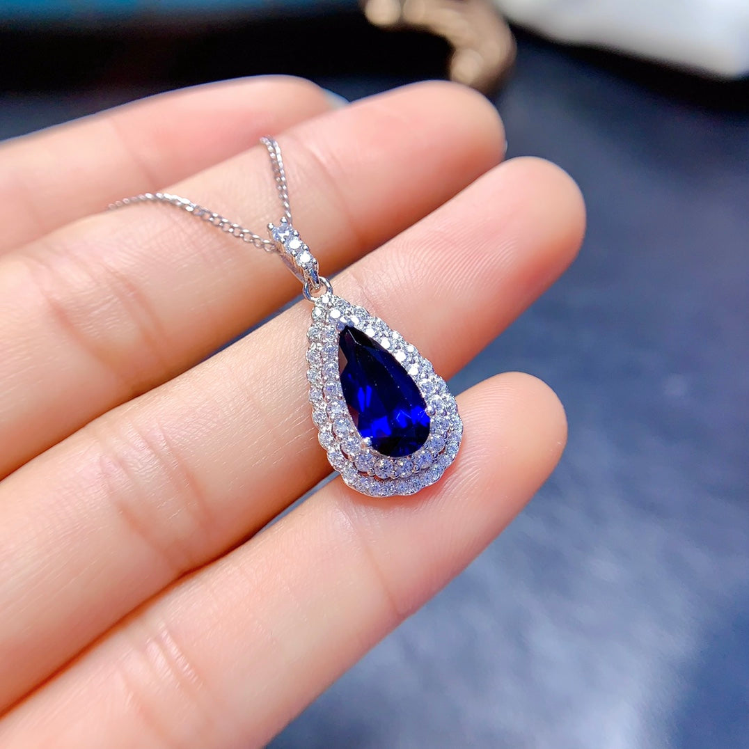 Natural crystal anf Sapphire necklace, teardrop-shaped, handcrafted with each stone being a large natural zircon. A luxurious piece to adorn your neck.