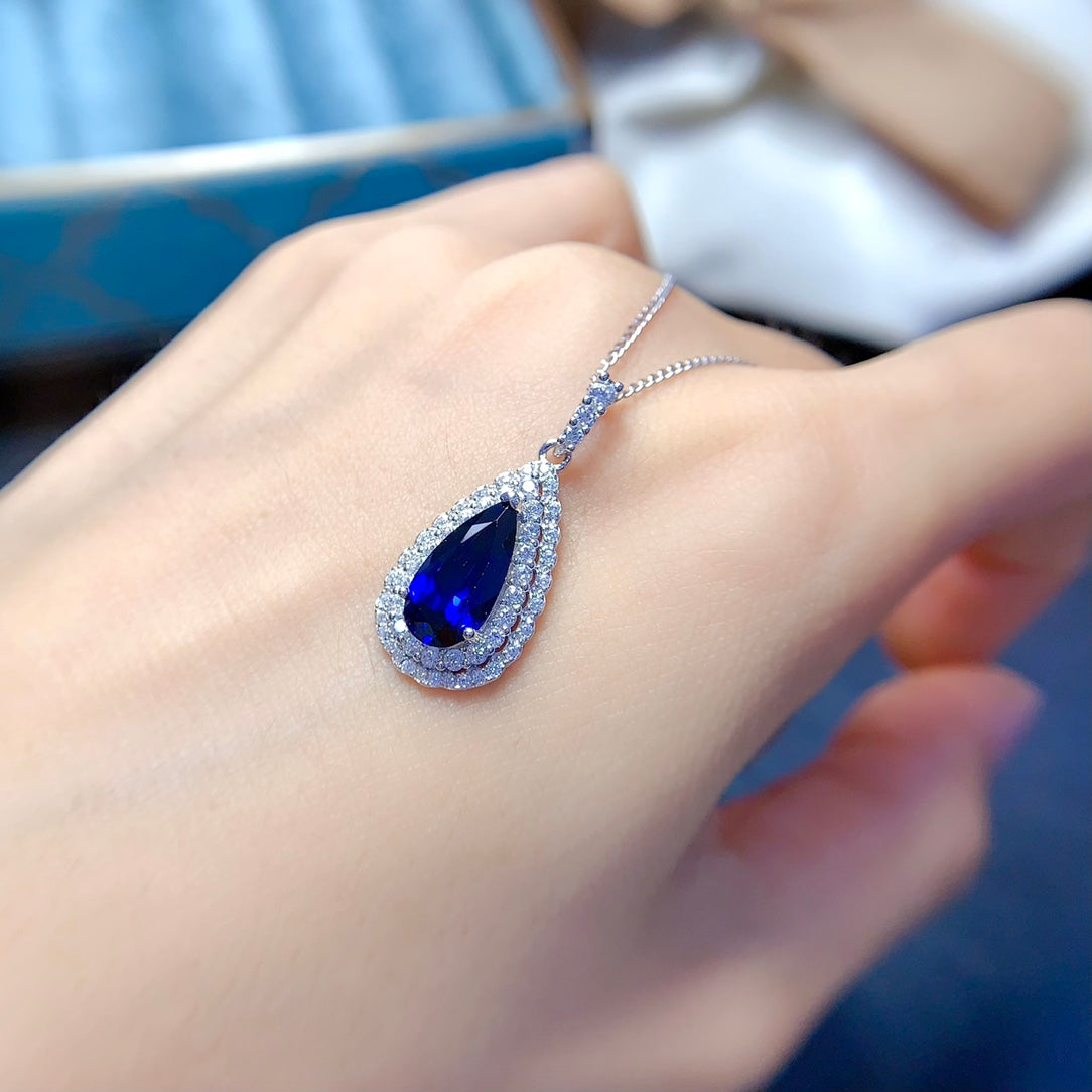 Natural crystal anf Sapphire necklace, teardrop-shaped, handcrafted with each stone being a large natural zircon. A luxurious piece to adorn your neck.