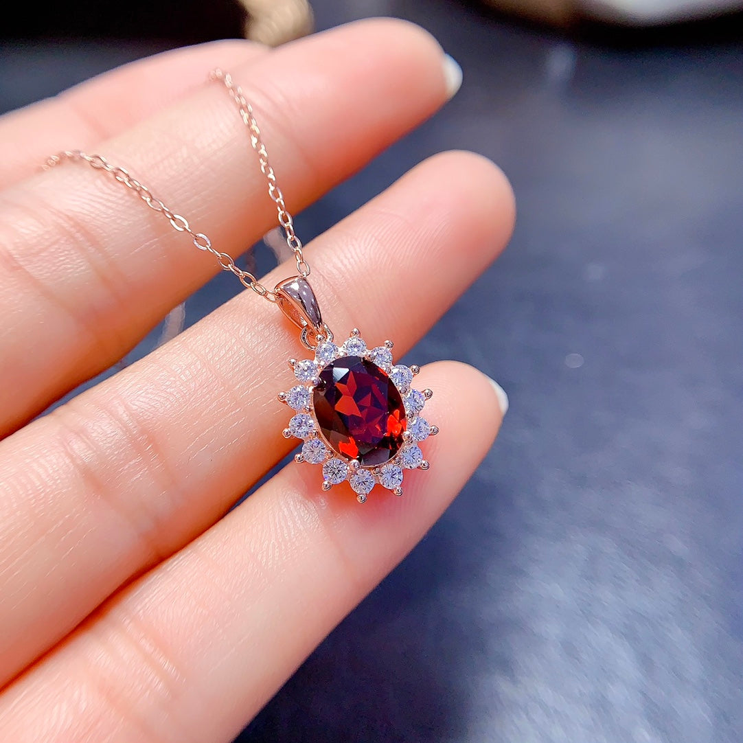 A set made of natural garnet, with a classic design and vibrant red hues in each gemstone, brings energy and elegance to your look.